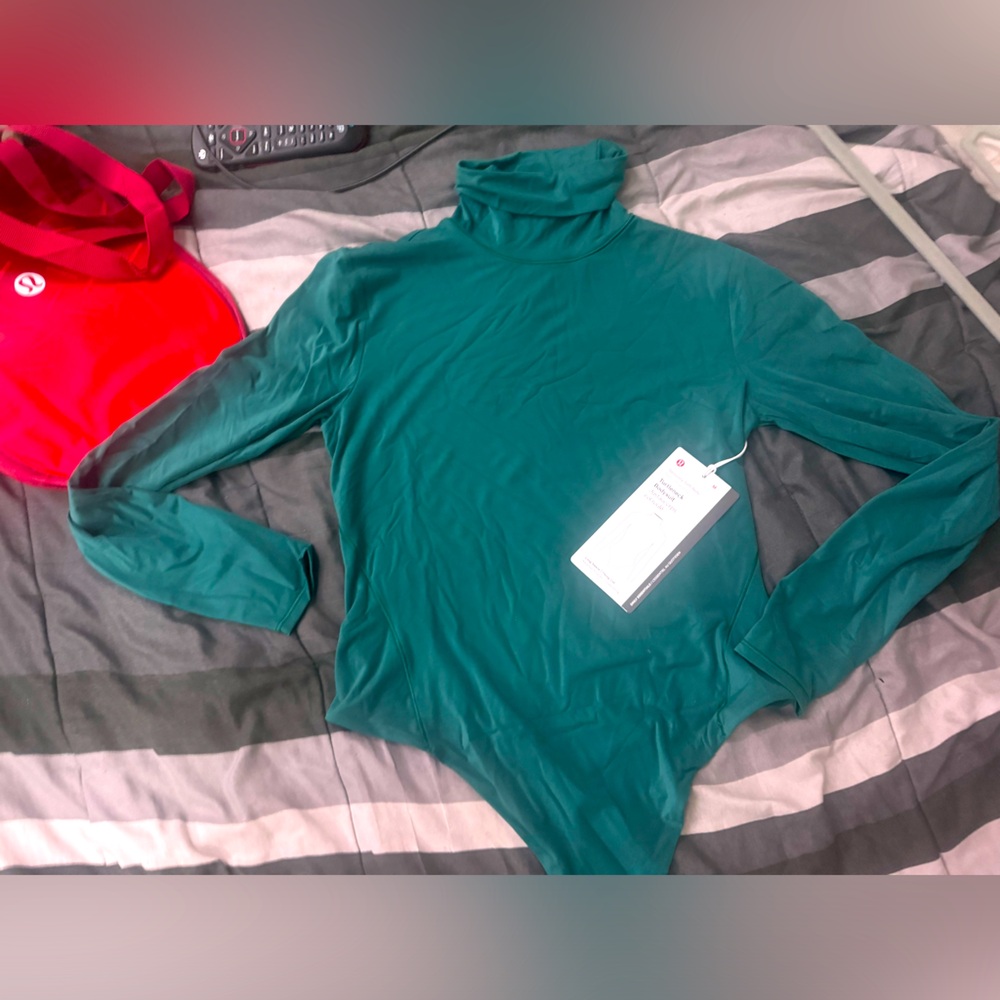 Lululemon turtle neck bodysuit NWT! Size medium.